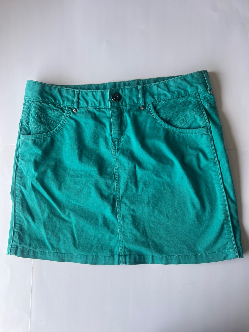 Athleta Teal Short Skirt with Branded Button